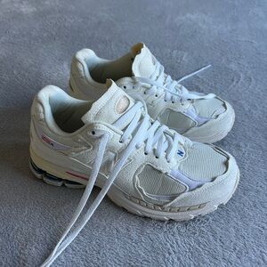 New Balance Cream and White Sneakers